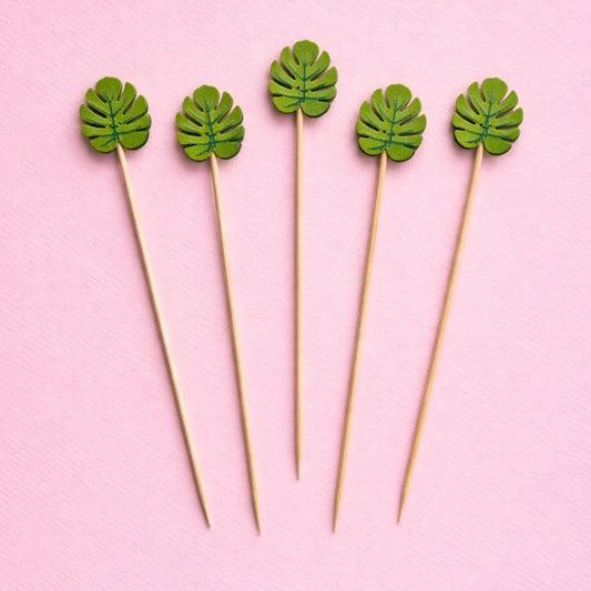 Monstera leaf cocktail picks by Sip & Shell – tropical party decor